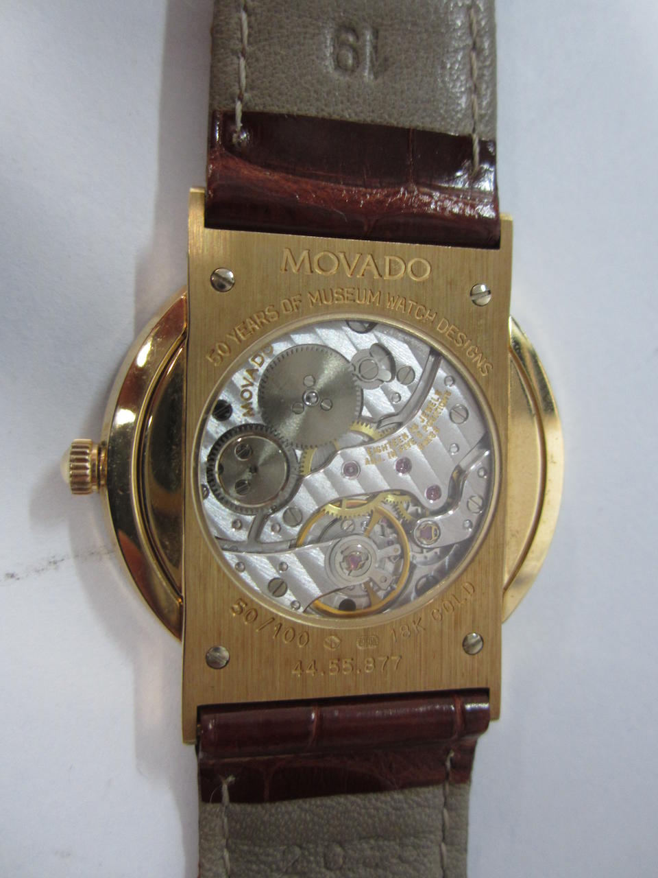 Movado. An 18K rose gold and ceramic manual wind wristwatch 50 years of Museum Watch Design, Ref:44.55.877, No.50/100, Sold 16th December 2005