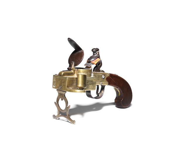 A George III brass, steel and walnut tinder pistol, or table 'strike-a-light', circa 1790 Signed 'Williams, London'