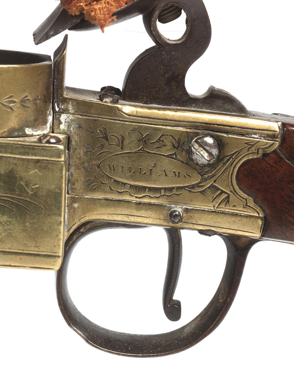 A George III brass, steel and walnut tinder pistol, or table 'strike-a-light', circa 1790 Signed 'Williams, London'