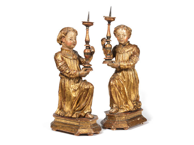 A large and fine pair of 16th century polychrome-decorated gilt gesso pricket figures, Italian, probably Tuscan or Umbrian  (2)