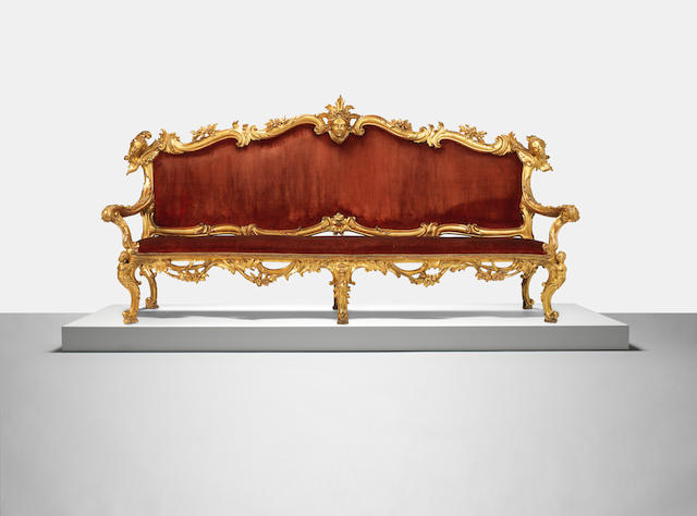 A pair of Italian mid 18th century giltwood 'portego' sofas of Roman origin (2)