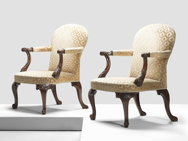 A pair of George III carved mahogany open armchairs circa 1760 (2)