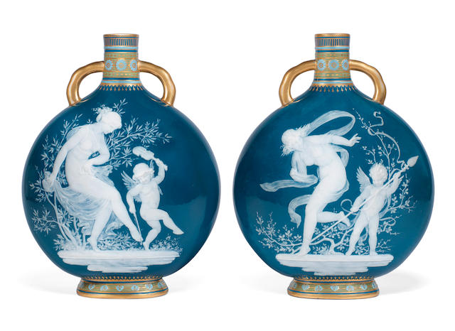 A fine pair of Minton p&#226;te-sur-p&#226;te moon flasks by Louis Solon, circa 1900