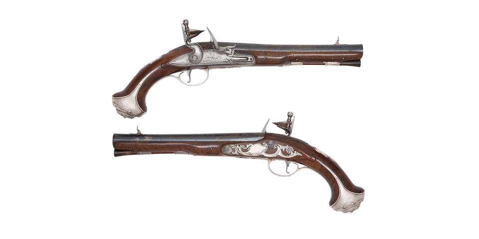 A Fine Pair Of 20-Bore Silver-Mounted Flintlock Holster Pistols (2)