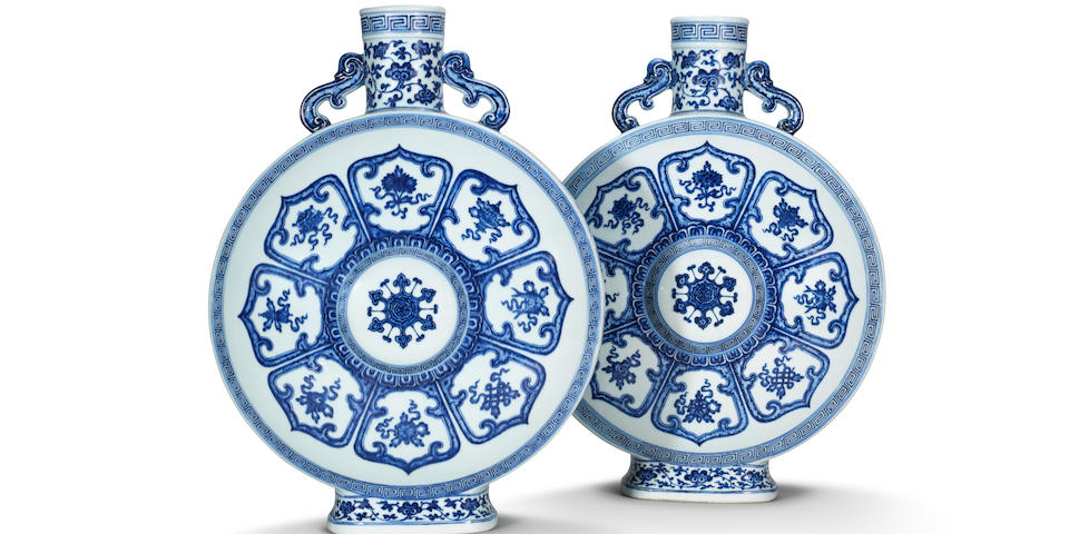 An exceptionally rare pair of Imperial blue and white 'Bajixiang' moonflasks, bianhu  Qianlong seal marks and of the period  (6)
