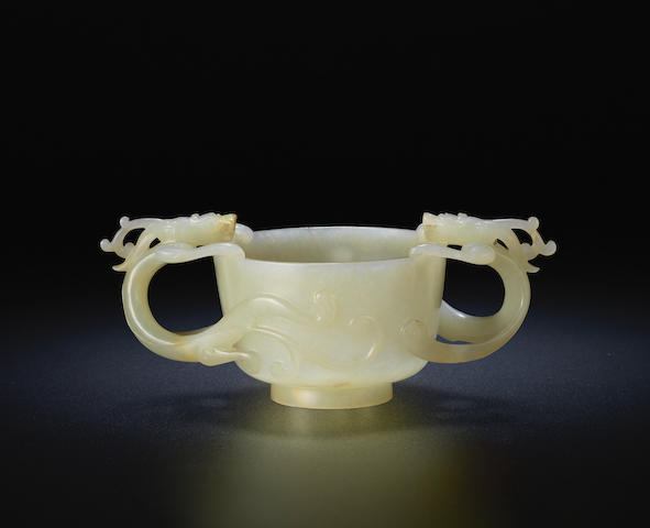 A pale green jade 'chi dragon' cup 14th/15th century (2)