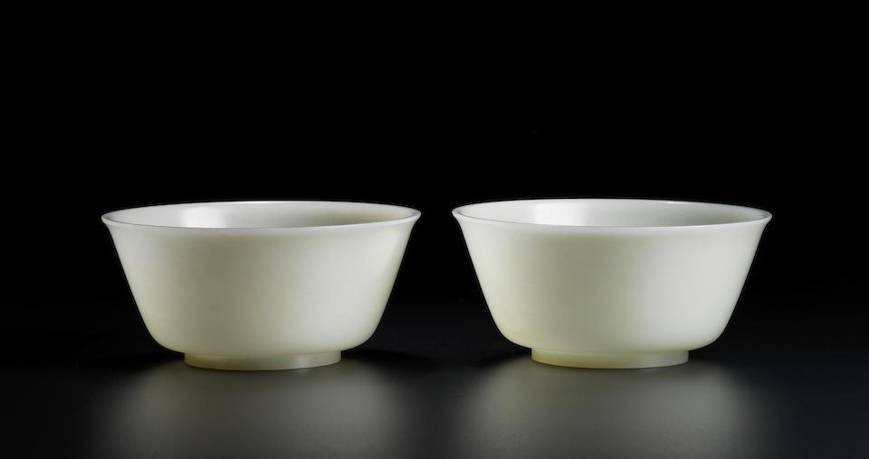 An exceptional pair of Imperial white jade bowls Incised Qianlong four-character marks and of the period (5)