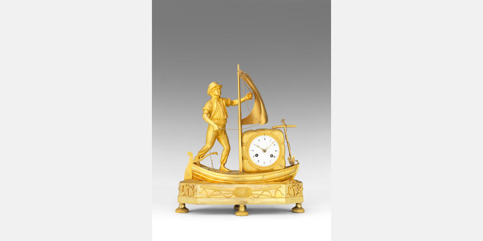 An early 19th century French gilt bronze figural mantel clock