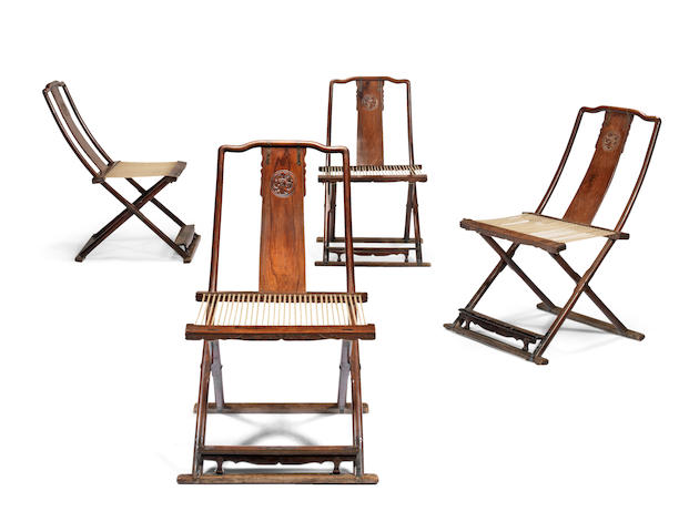 An important and exceptionally rare set of four huanghuali folding chairs, Jiaoyi 16th/17th century (4)