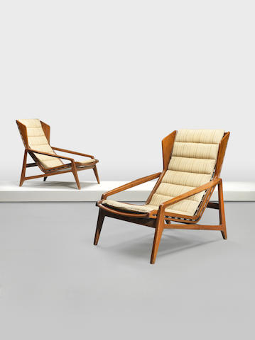 Gio Ponti,  A pair of Modello 811 armchairs c.1957 for Cassina Walnut, woven fabric upholtsery (original and modern replacement set), both chairs with manufacturer's label 71cm x 97cm x 86cm