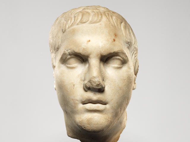 A Roman marble portrait head of a young man