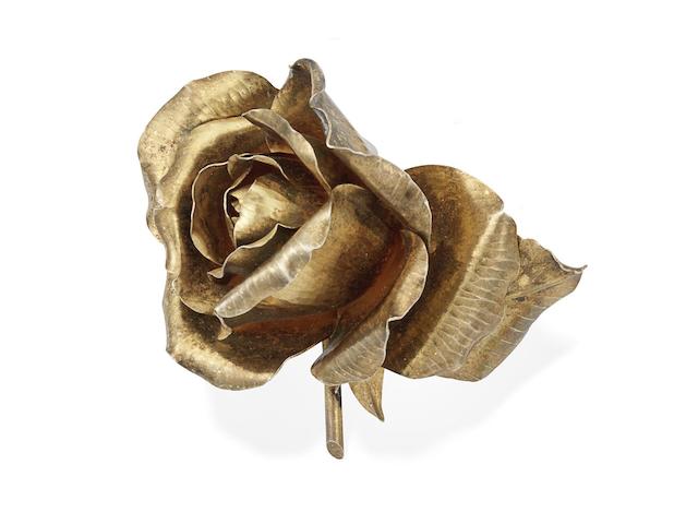 A gilt-metal rose brooch, by G. Lecomte,