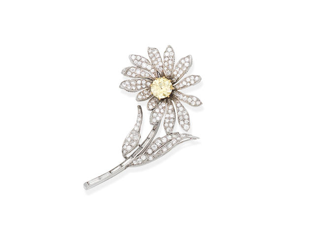 A diamond flower brooch,