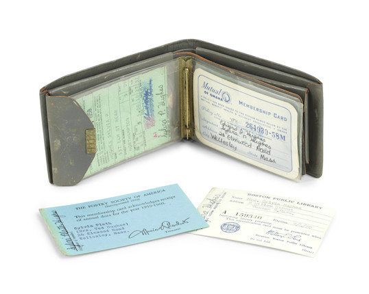 PLATH (SYLVIA) Wallet containing seven membership and ID Cards, including her Boston Public Library card, her Poetry Society of America membership card, and her driving licence, six of them SIGNED BY SYLVIA PLATH, together with a small photograph of Sylvia, her mother and brother seated by a Christmas tree, 1950s image 1