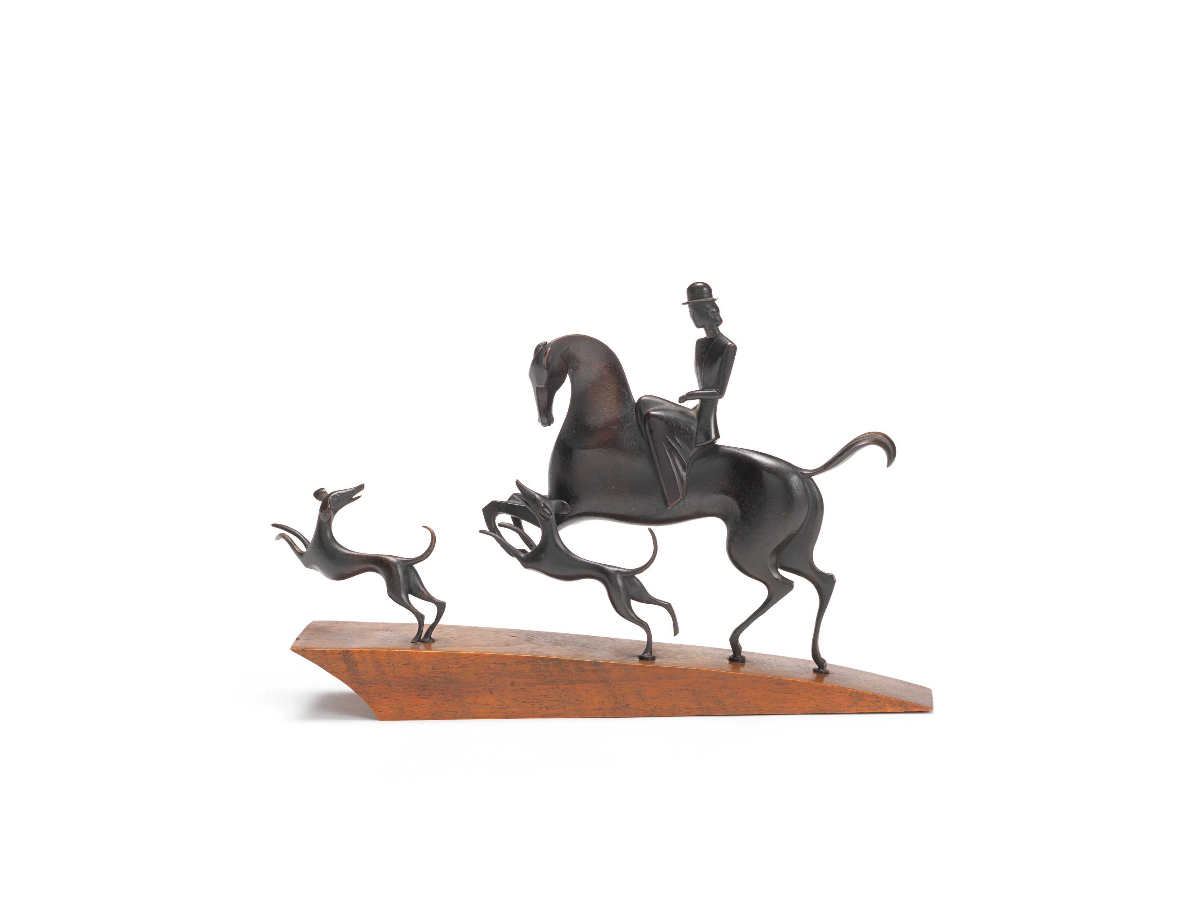 Bonhams a stylish art deco patinated bronze hunting group by