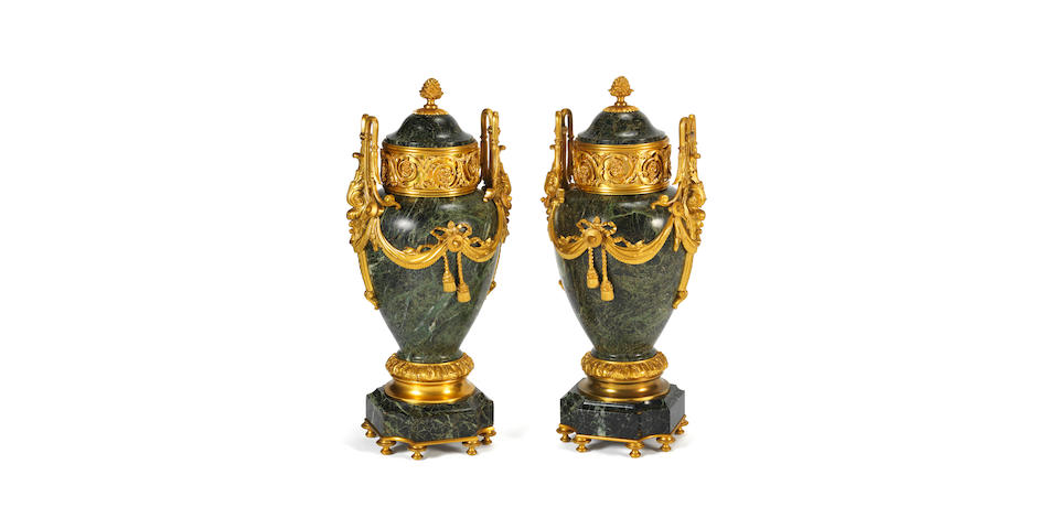 A pair of French late 19th century green marble and gilt bronze urns and covers (2)