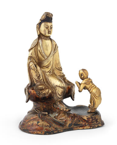 A gilt-bronze group of Guanyin and Sudhana Ming Dynasty
