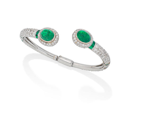An emerald and diamond torc bangle,
