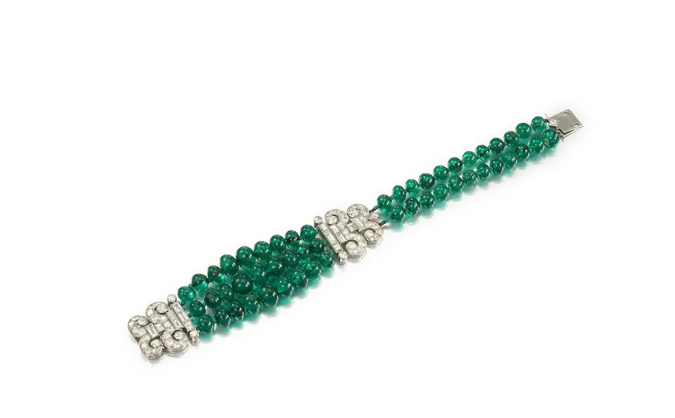 An art deco emerald and diamond bracelet, by Cartier,
