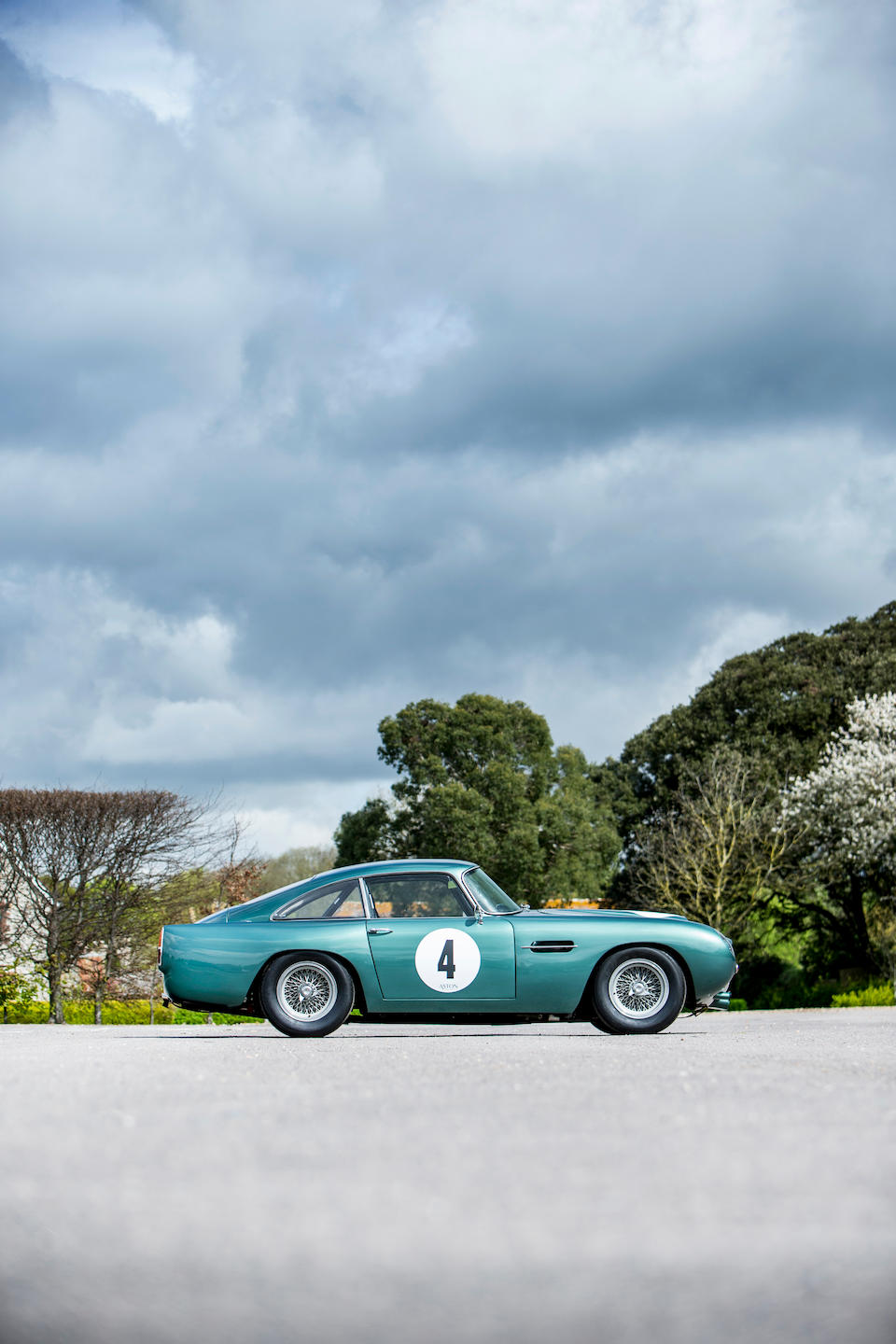 The ex-Peter Thornton, Ian Dalglish actively and successfully campaigned,1960 Aston Martin DB4 GT  Chassis no. 370/0110/GT (original engine offered with motor car); and a race unit installed with no number.