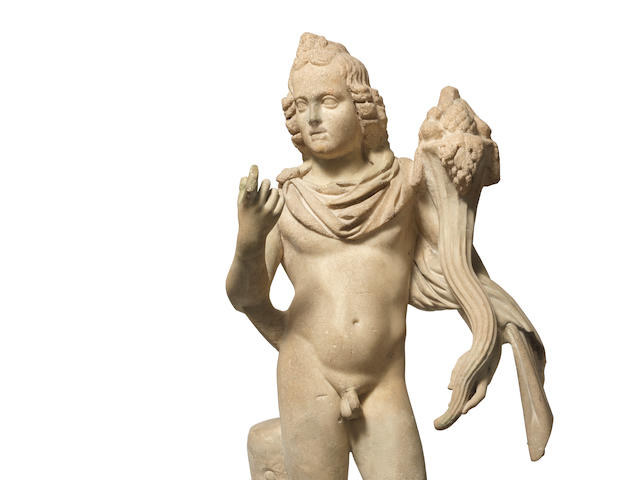 A Roman marble statue of Harpocrates