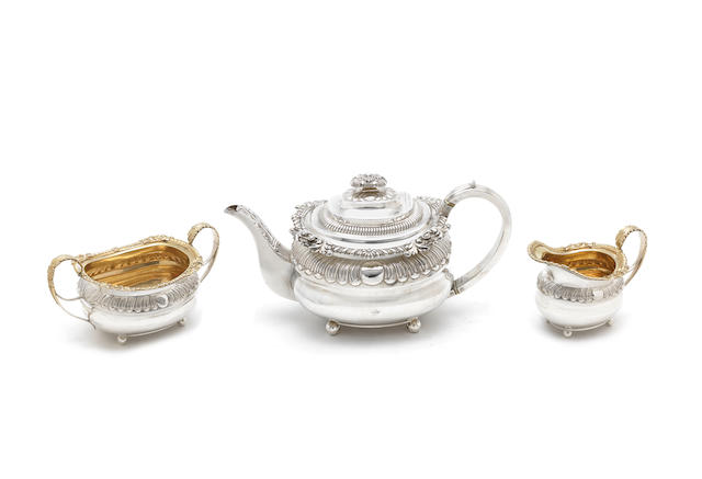 A George III three-piece silver tea service by Solomon Hougham, London 1815 / 1816  (3)