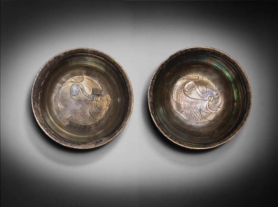 An exceptionally rare pair of parcel-gilt silver 'carp' bowls Liao Dynasty (2)