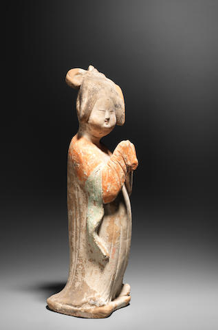 A pottery figure of a court lady  Tang Dynasty