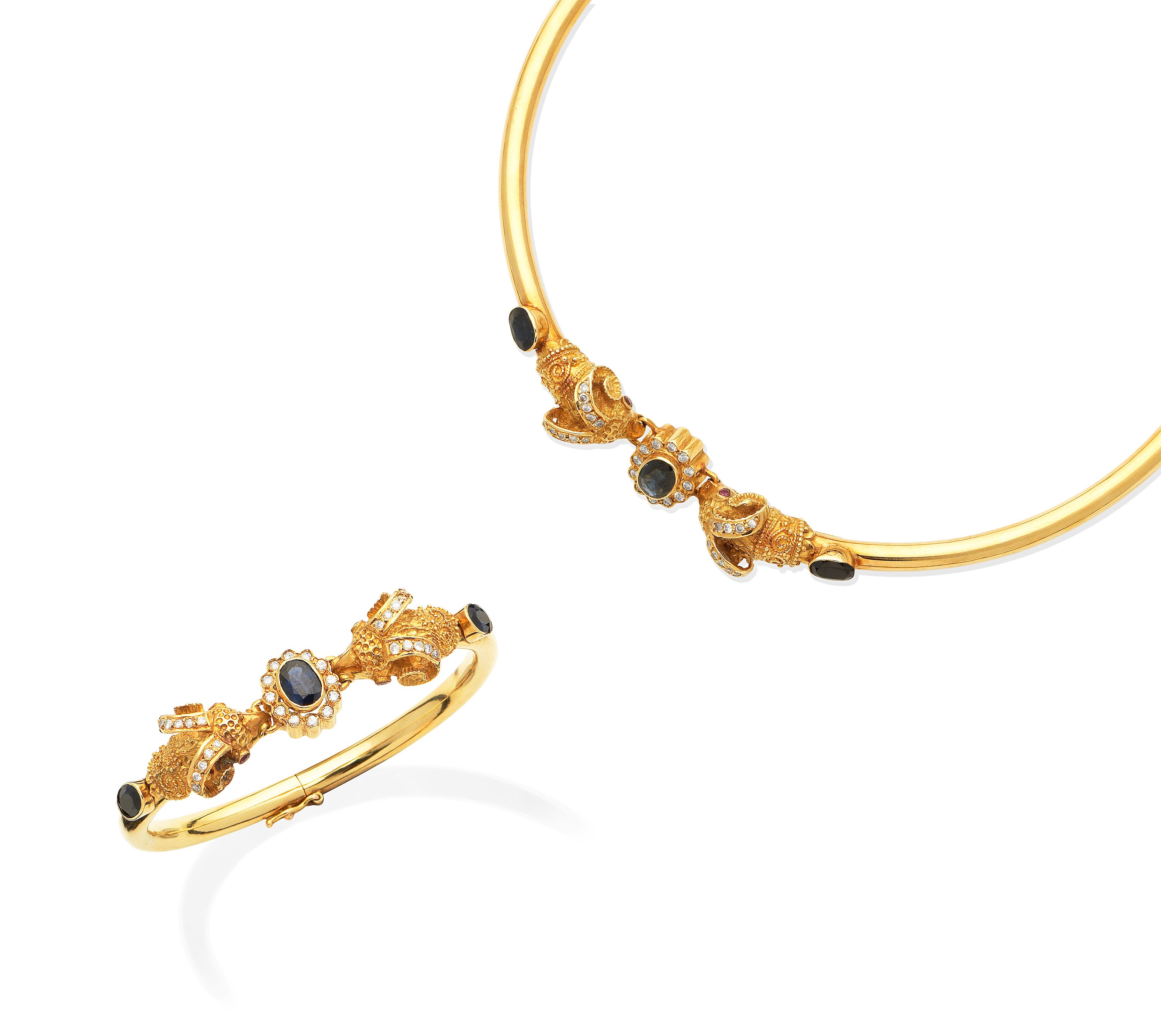 Bonhams : A sapphire, ruby and diamond torque necklace and bangle suite ...