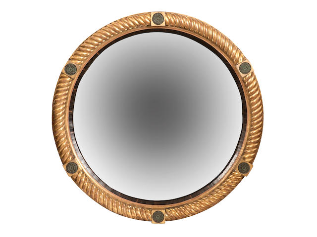 A large 19th century giltwood and gesso convex mirror