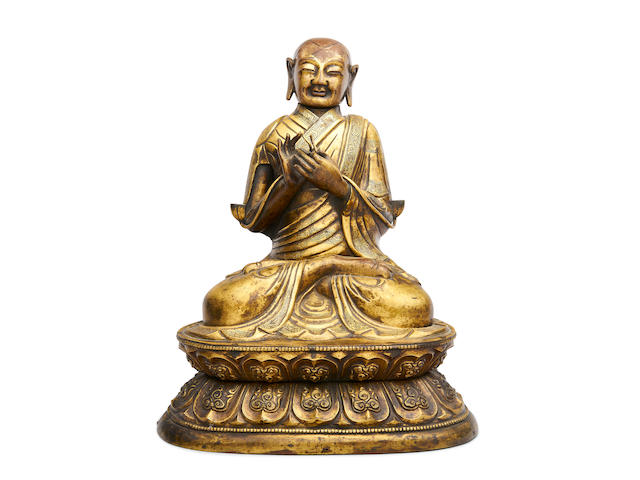 A Sino-tibetan gilt copper alloy repouss&#233; figure of Tsong Kharpa 18th century