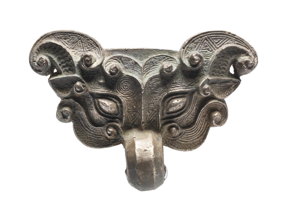 A rare pair of silver taotie-mask handles Warring States Period (2)