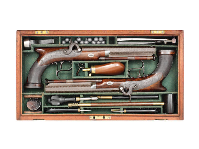 A Fine Cased Pair Of Irish 36-Bore Percussion Saw-Handled Duelling Or Target Pistols