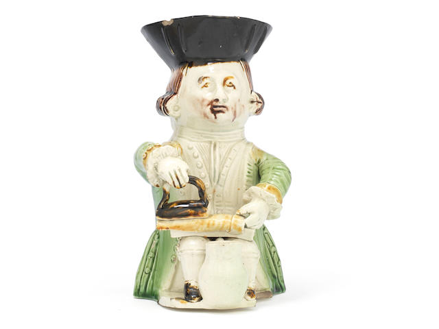 An exceptional 'Tailor' Toby jug from the 'Midshipman Family', circa 1785