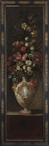 Roman School, 17th Century Tulips, lilies, a sunflower and other flowers in a majolica urn with serpentine handles