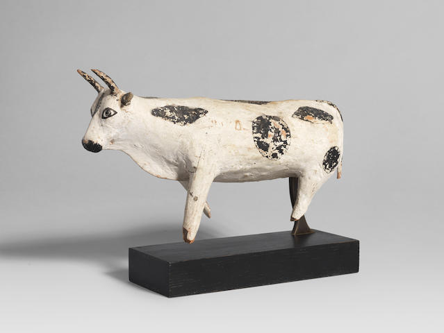 An Egyptian painted wood model of a bull