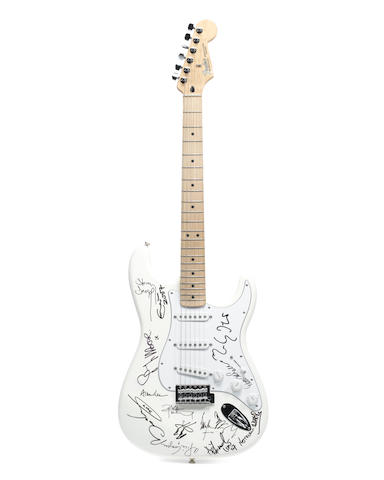 A multi-signed Fender Stratocaster guitar sold on behalf of the Rainbow Children's Hospice, signatures obtained 2007-2018,