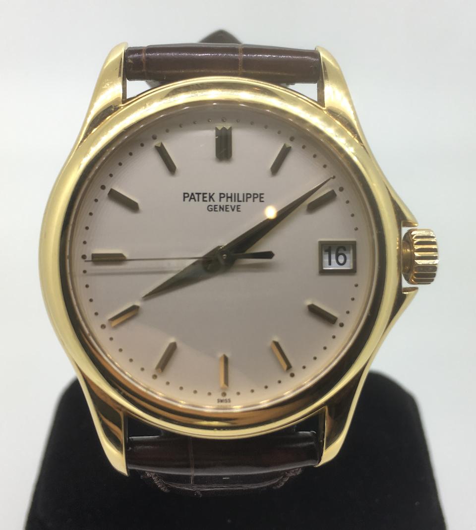 Patek Philippe. An 18K gold automatic calendar wristwatch  Calatrava, Ref: 5227, Sold 08th May 2006