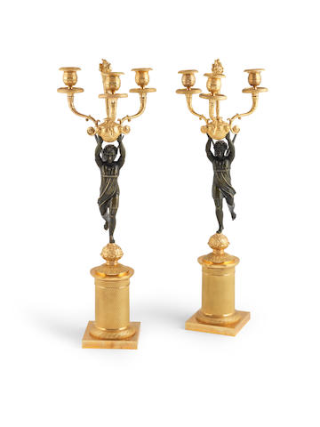 A pair of French 19th century gilt and patinated bronze candelabra Probably Restoration (2)