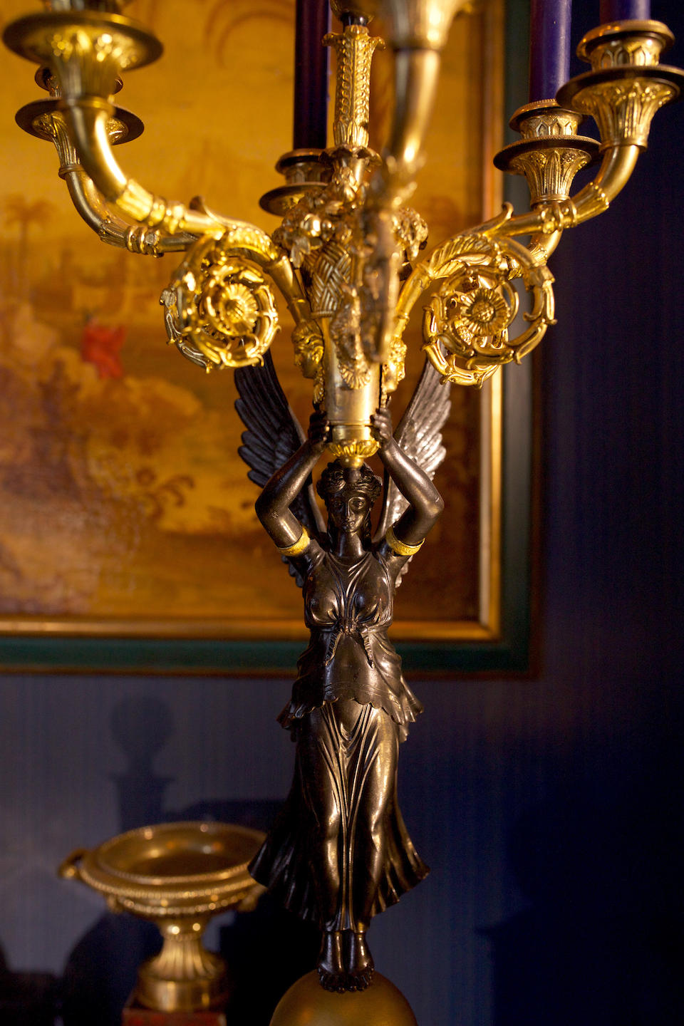 A large pair of French 19th century gilt and patinated bronze six branch candelabra In the manner of Pierre-Philippe Thomire (2)