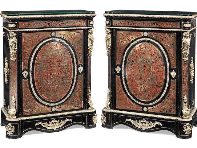 A pair of Napoleon III gilt bronze mounted tortoiseshell and brass 'Boulle' marquetry ebonised pier cabinets  (2)