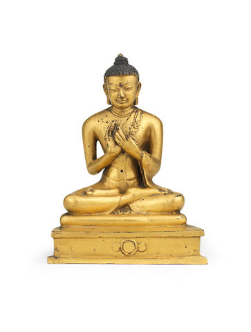 A rare gilt copper-alloy figure of Shakyamuni Buddha Tibet, 15th century