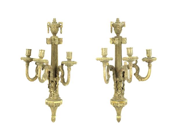 A pair of 19th century gilt gesso and carved wood three light wall appliqu&#233;s in the Louis XVI style
