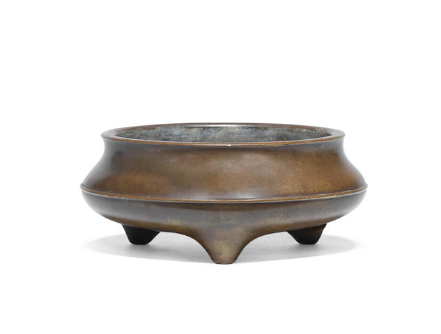 A bronze tripod incense burner, ding Yu tang qing wan four-character mark, 17th/18th century