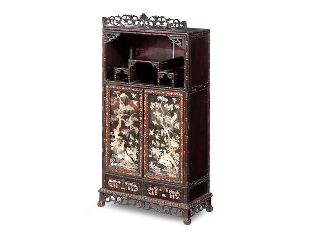 A blackwood 'faux-bamboo'-framed cabinet with embroidered silk panel doors Qing Dynasty, late 19th century