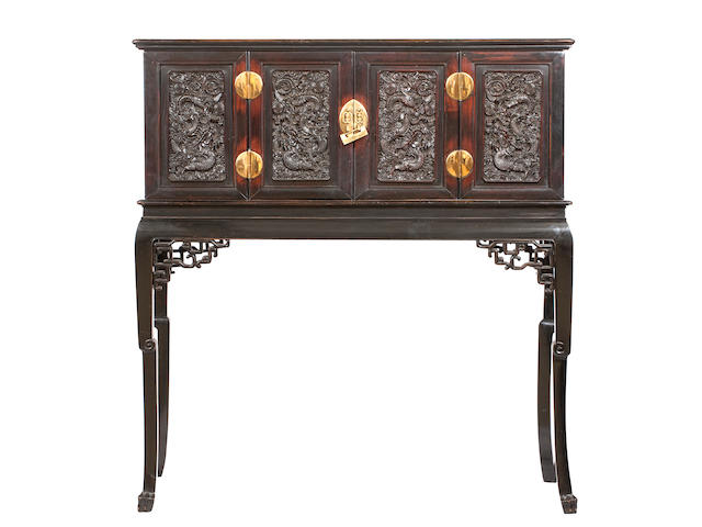 A huanghuali cabinet on a stained-wood stand Cabinet Qing dynasty, the stand later circa 1900