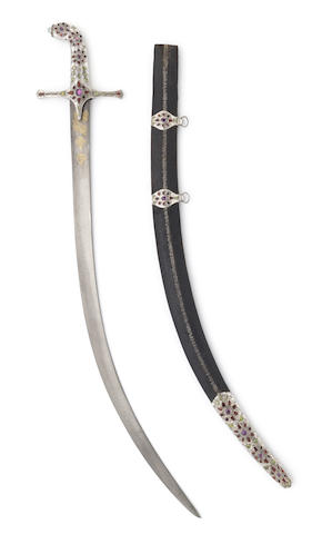 A fine gold-damascened watered steel sword (shamshir) bearing the name of Fath 'Ali Shah Qajar (reg. 1798-1834) Persia, dated AH 1217/ AD 1802-3