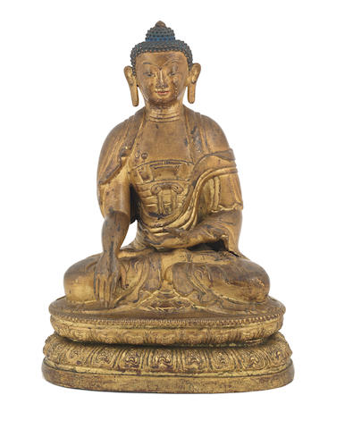 A rare gilt-lacquer bronze repouss&#233; figure of Buddha  Qianlong incised seven-character mark and of the period (2)