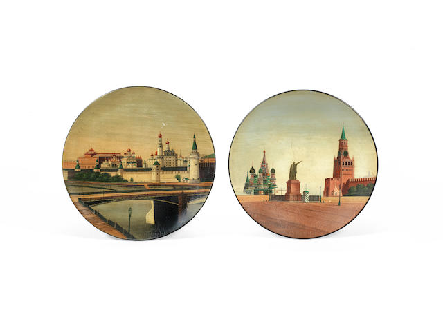 A late 19th / early 20th century Vishniakov papier mache lacquered and painted plate depicting a topographical view of Moscow together with a similar period Russian papier mache plate (2)