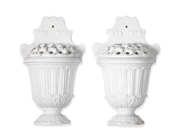 A pair of Mennecy white wall-sconces or bouqueti&#232;res, circa 1760